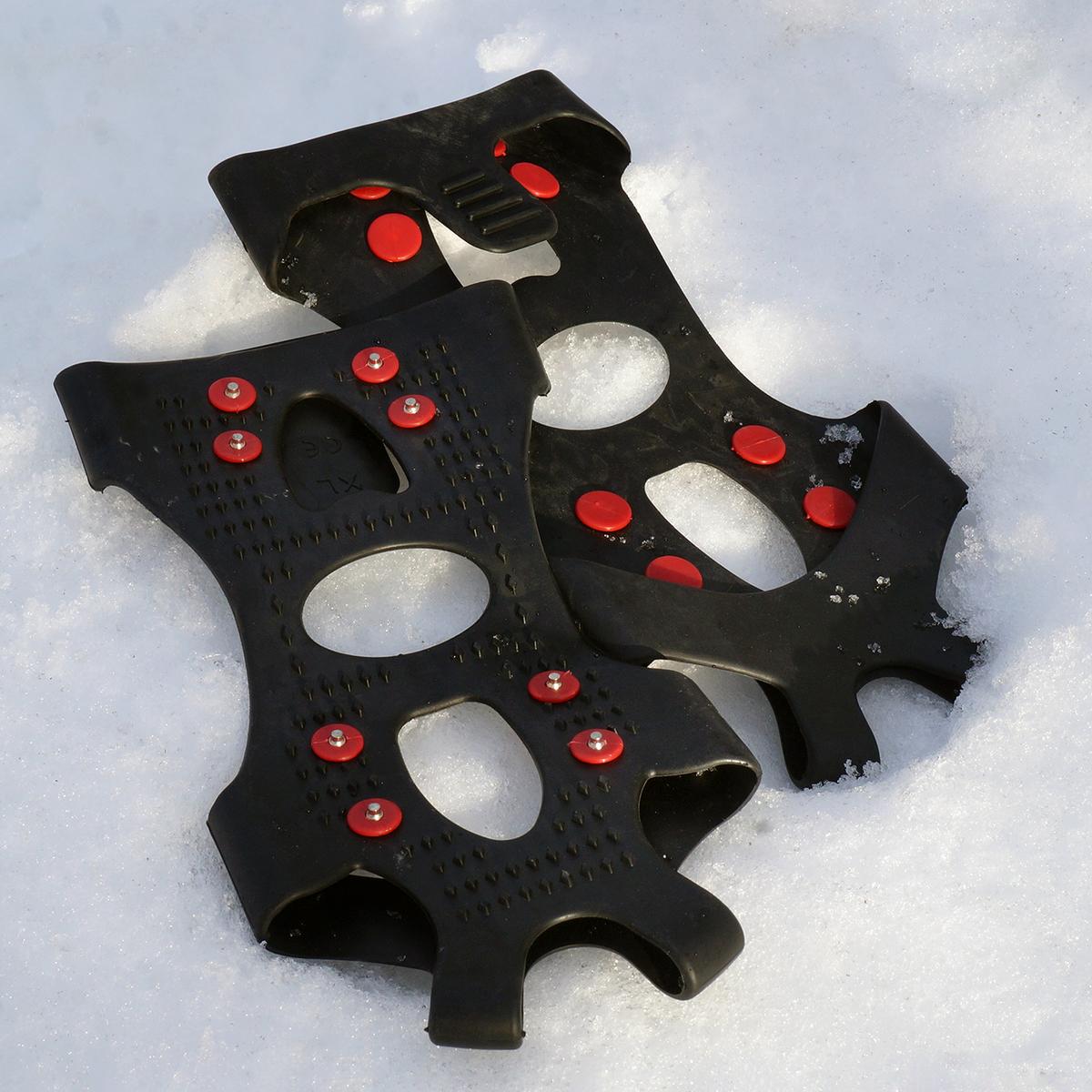 Action Traction Original Ice Cleats — sole view showing replaceable steel spikes